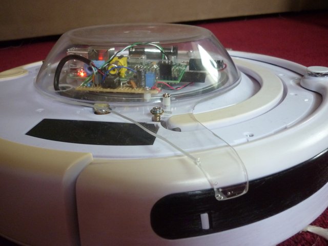 A raspberry pi on a Roomba - side view